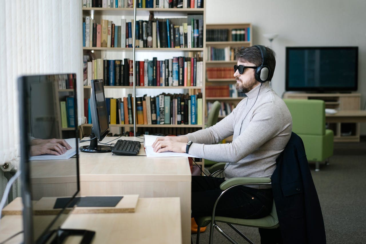 Someone reading and working at home